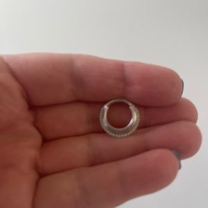 Maria Tash - white gold with diamonds piece for daith/ septum piercing.